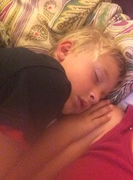 C NEVER falls asleep next to mom -- had to capture