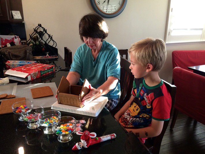 Grandma is here!  Building a gingerbread house