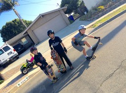 Nick trying skateboarding with Ryder and Carter