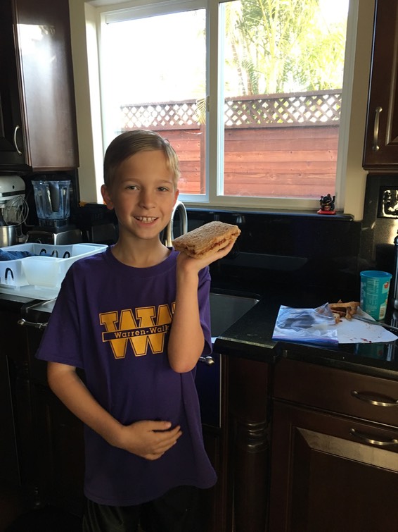 C's first peanut butter and jelly sandwich