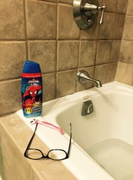 Mommy taking a bath but can only reach spiderman soap