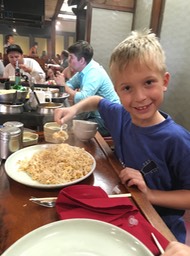 This kid LOVES fried rice